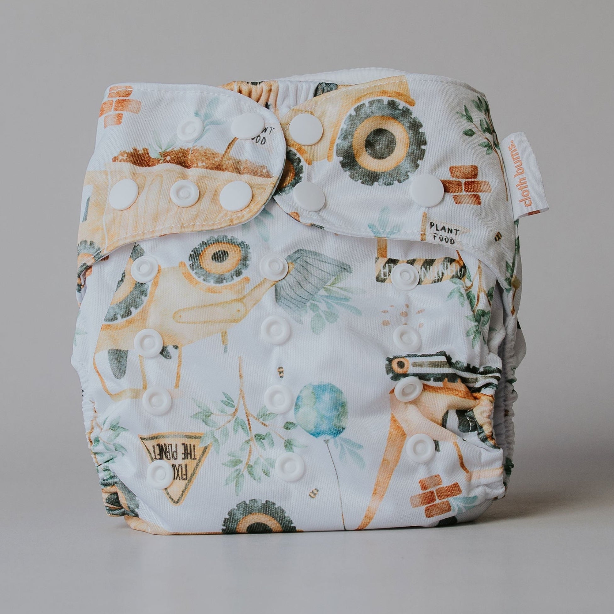 Construction patterned diaper on a plain background