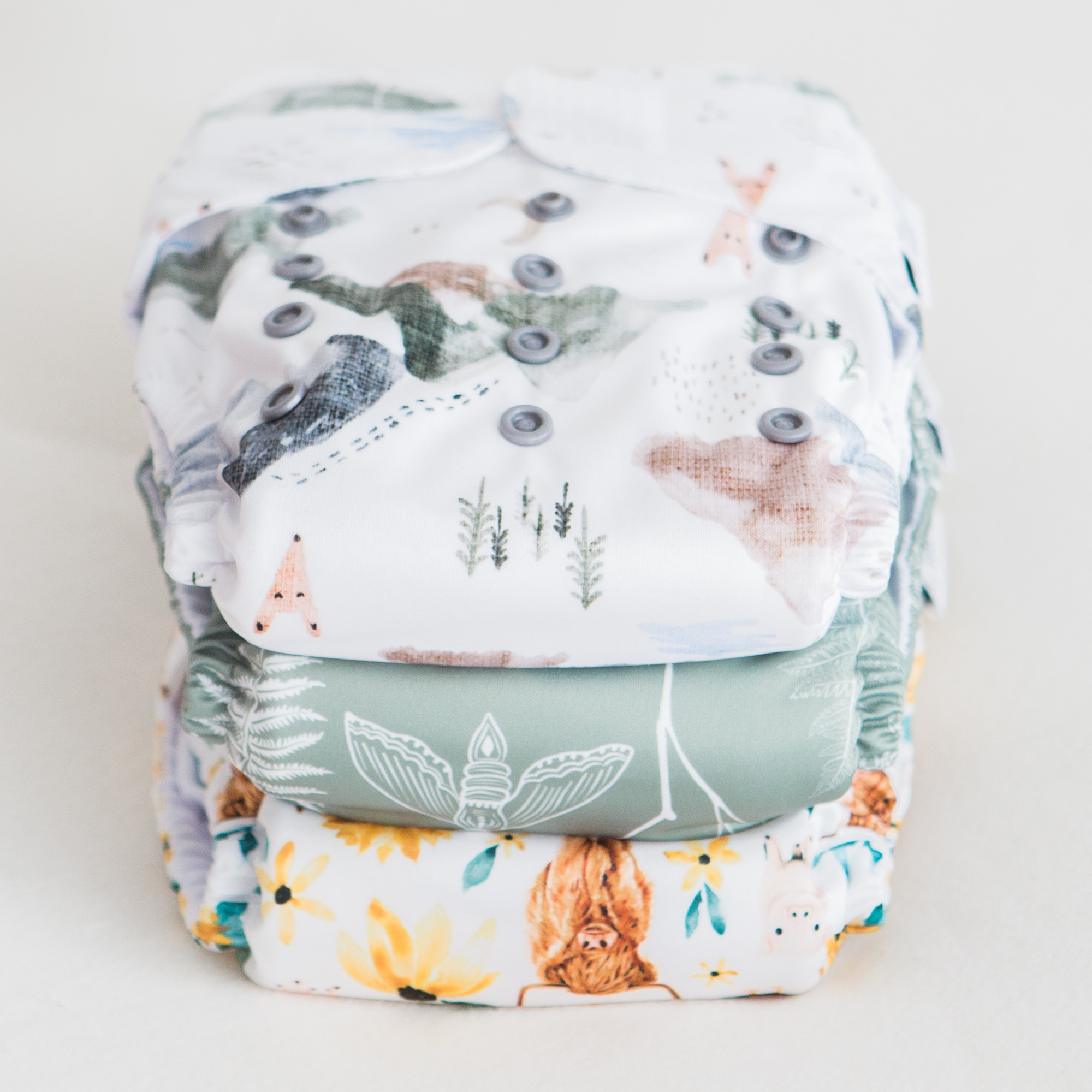 Junior Tribe Co modern cloth nappies in a row