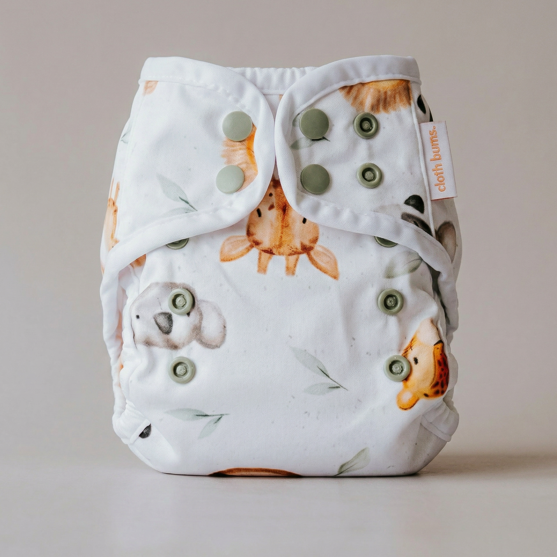 Patterned diaper with animal design on a neutral background