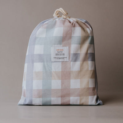 Cloth Bums Checkpoint waterproof fitted sheet on a bed