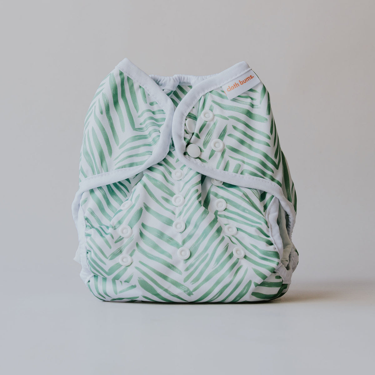 Dragon wrap nappy cover in Greenhouse print by Cloth Bums