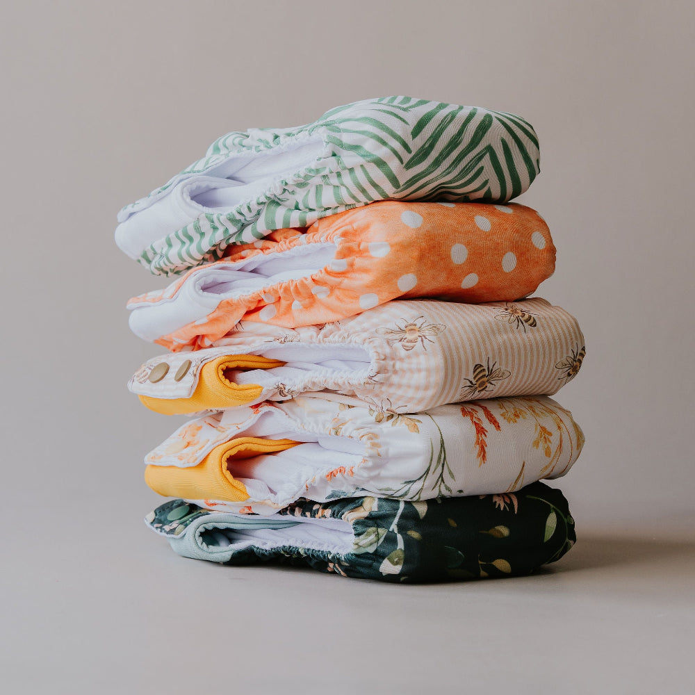 Gremlin pull-up nappies in the five new prints, stacked side view