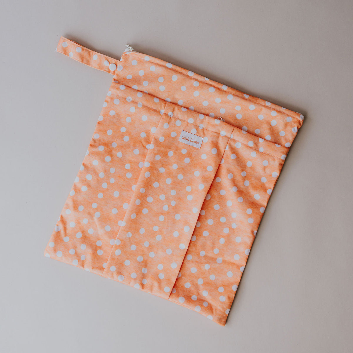 Large double pocket wet bag in Marmalade print by Cloth Bums