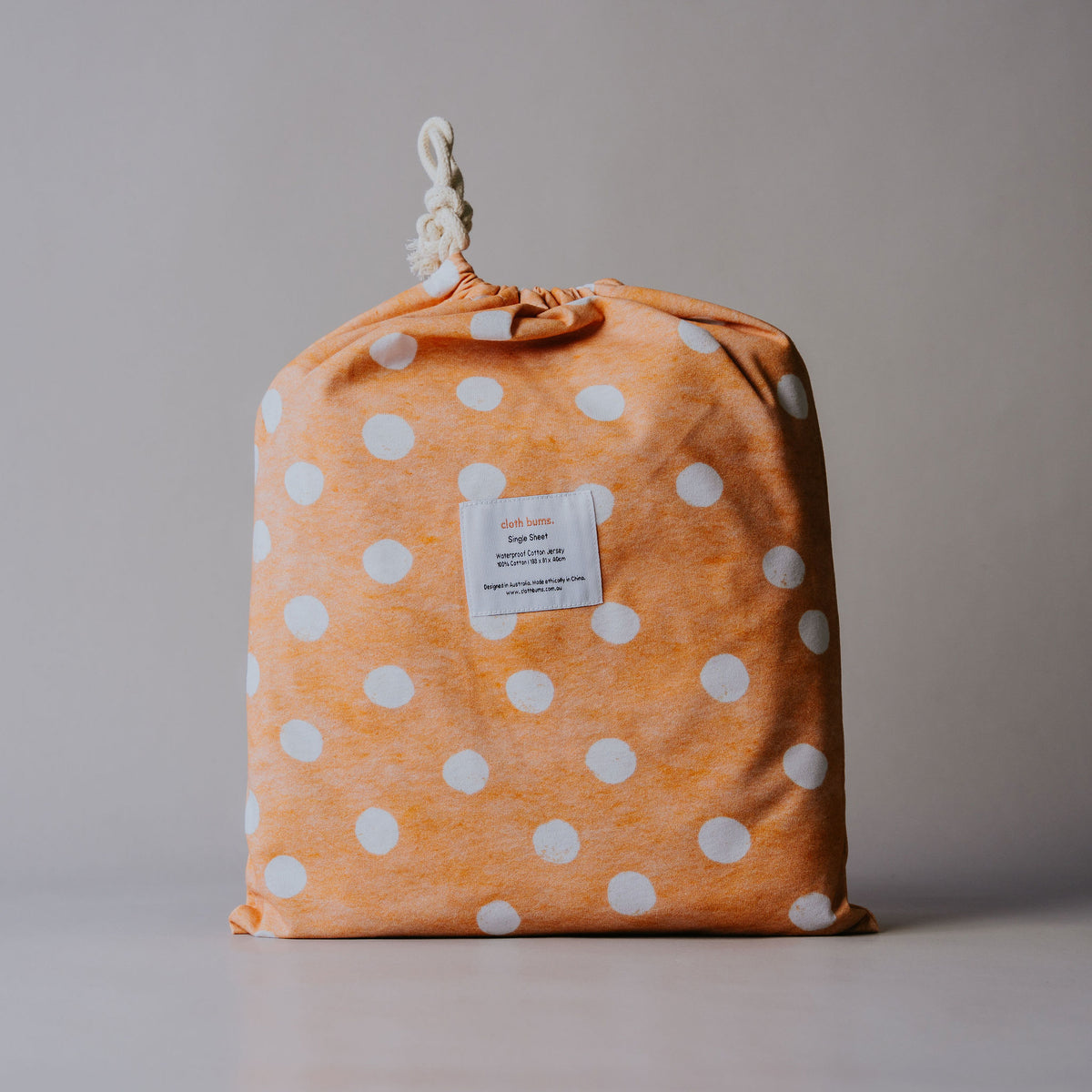 Single / king single waterproof fitted sheet in Marmalade print, in its drawstring bag