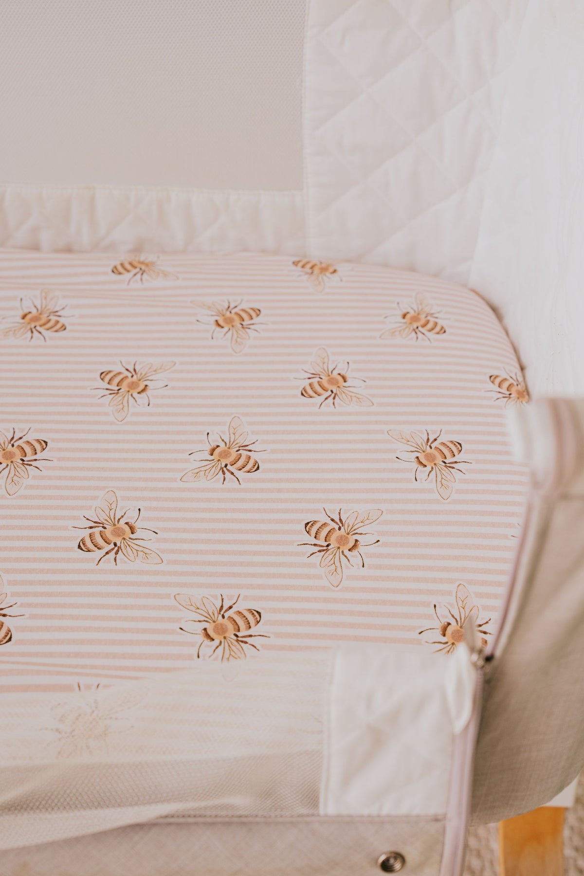 Bedside co-sleeper made up with the Beeline waterproof sheet
