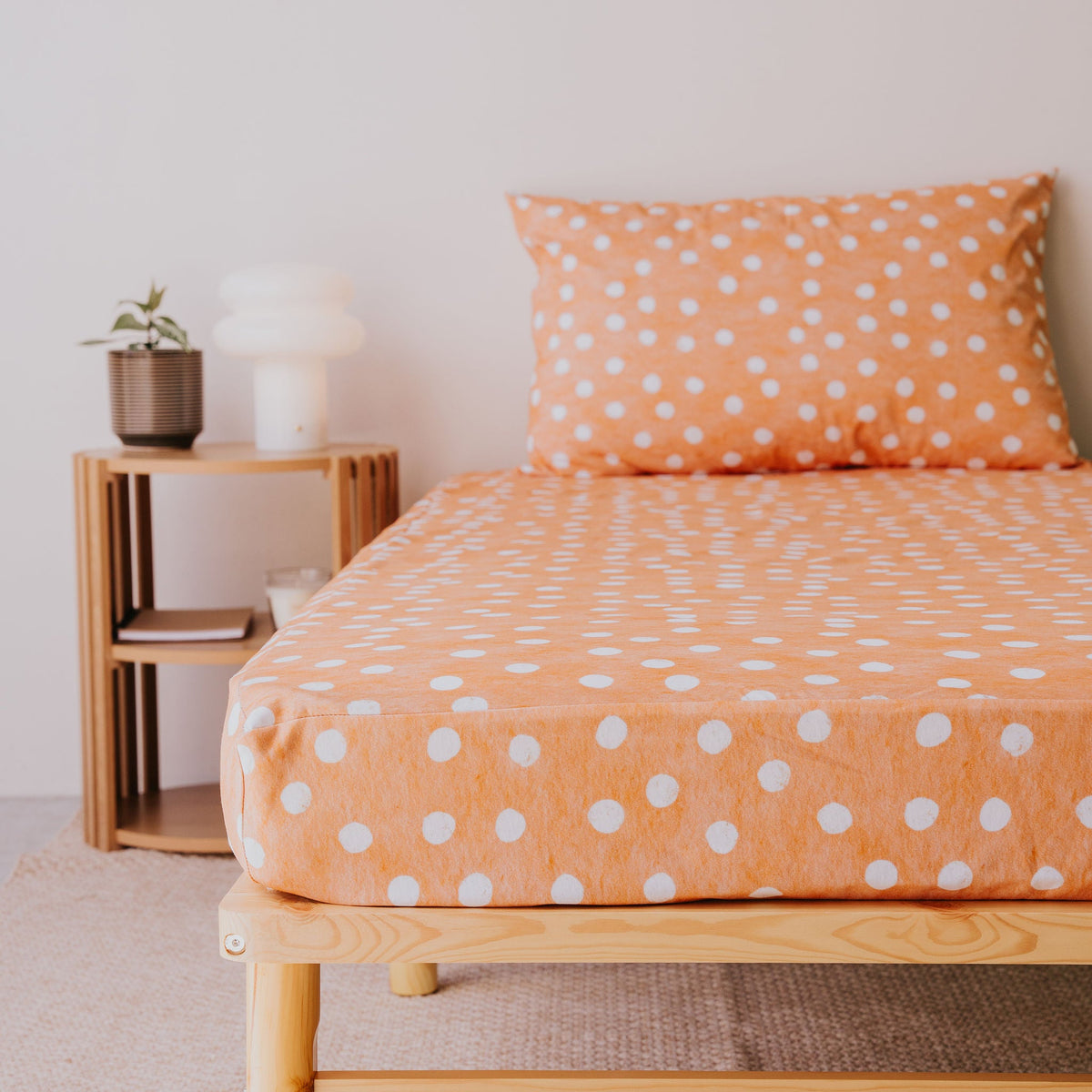 Single bed made up with the Marmalade waterproof fitted sheet and pillowcase