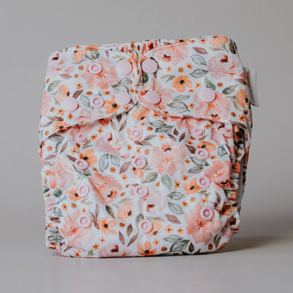 Floral-patterned diaper on a plain background