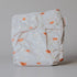 Sun patterned cloth diaper on a plain background