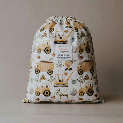 Cloth Bums Gold Digger waterproof fitted sheet on a bed