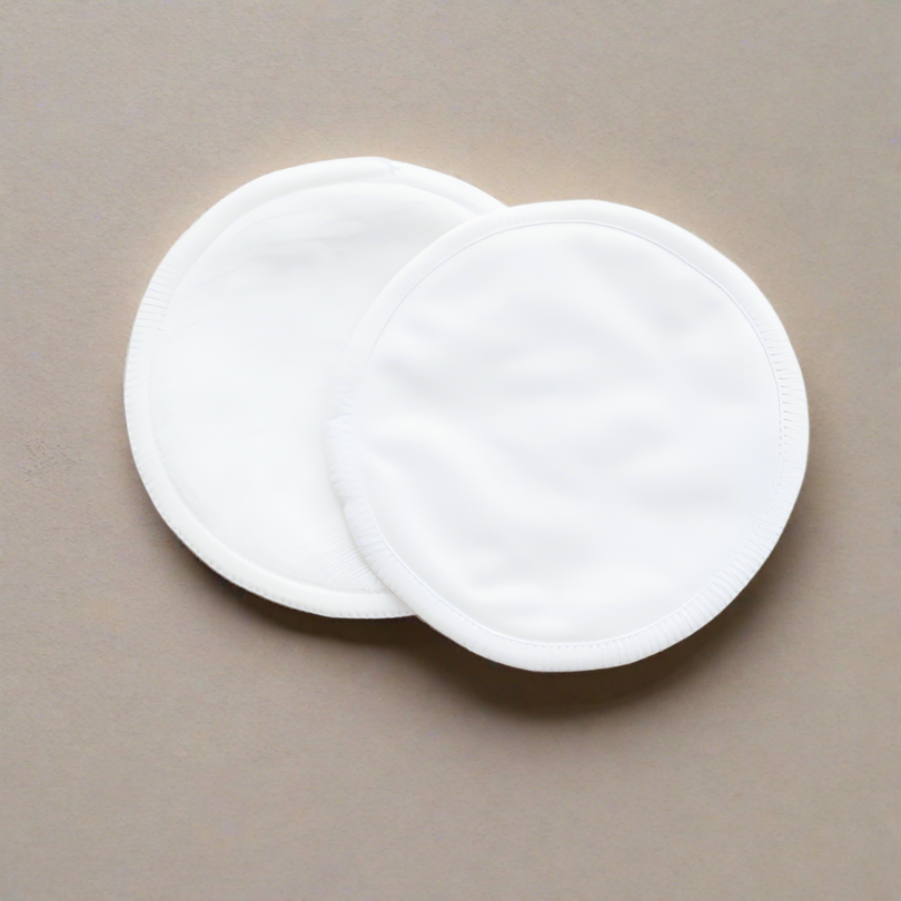 Set of white reusable breast pads