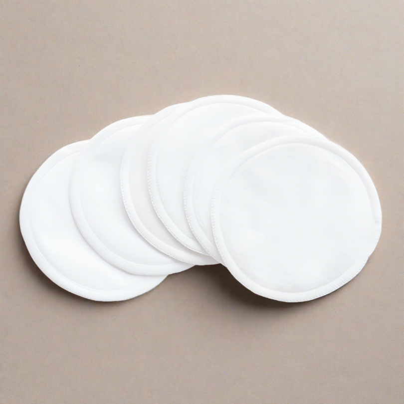 Set of white reusable breast pads