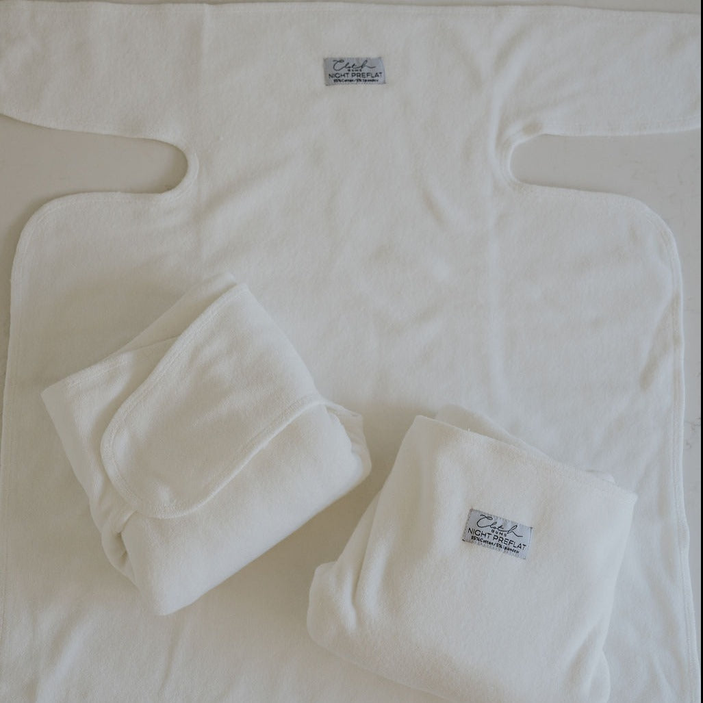 Flat lay of a white preflat nighttime cloth nappy